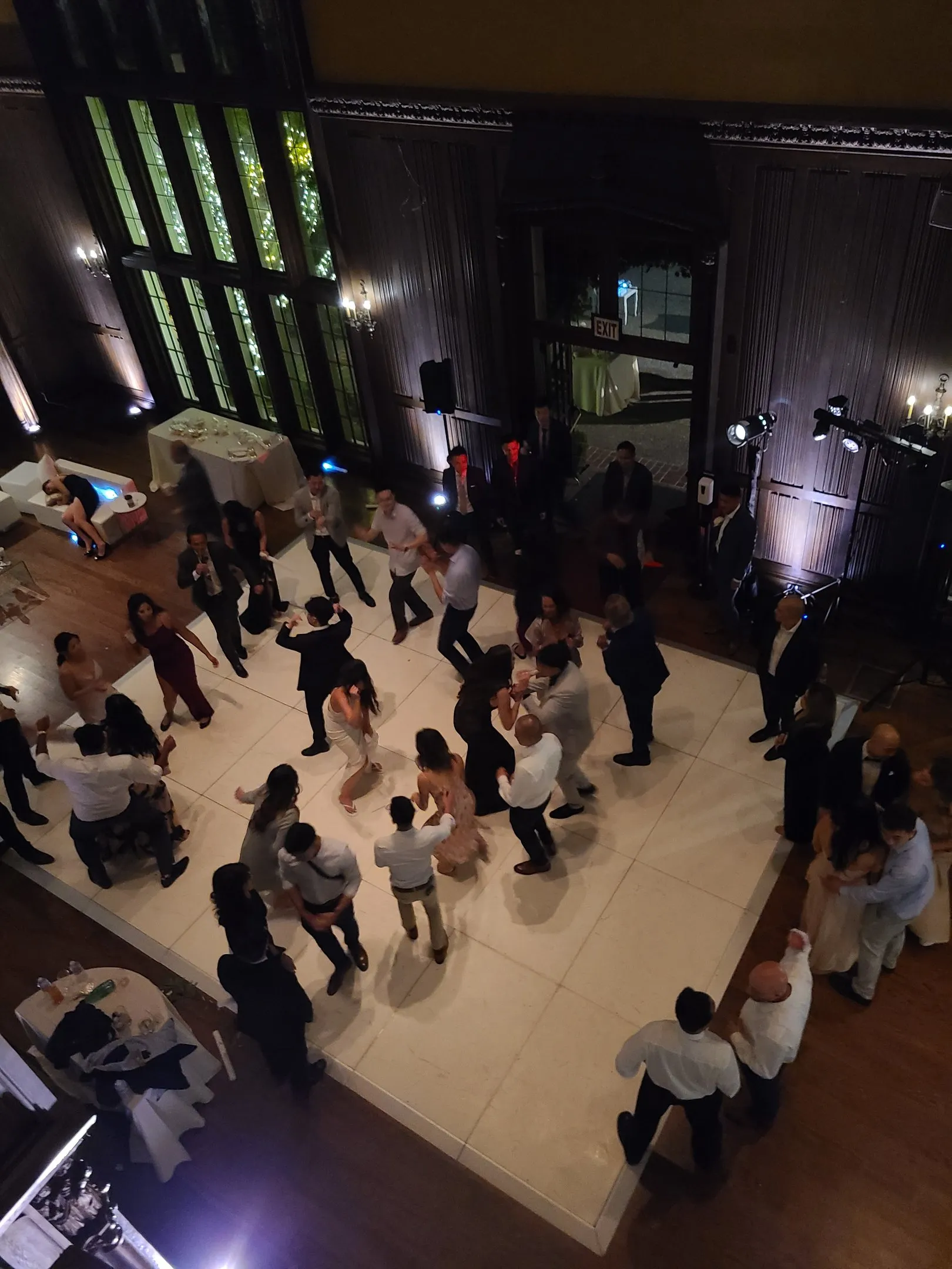 A packed ballroom dance floor seen from above
