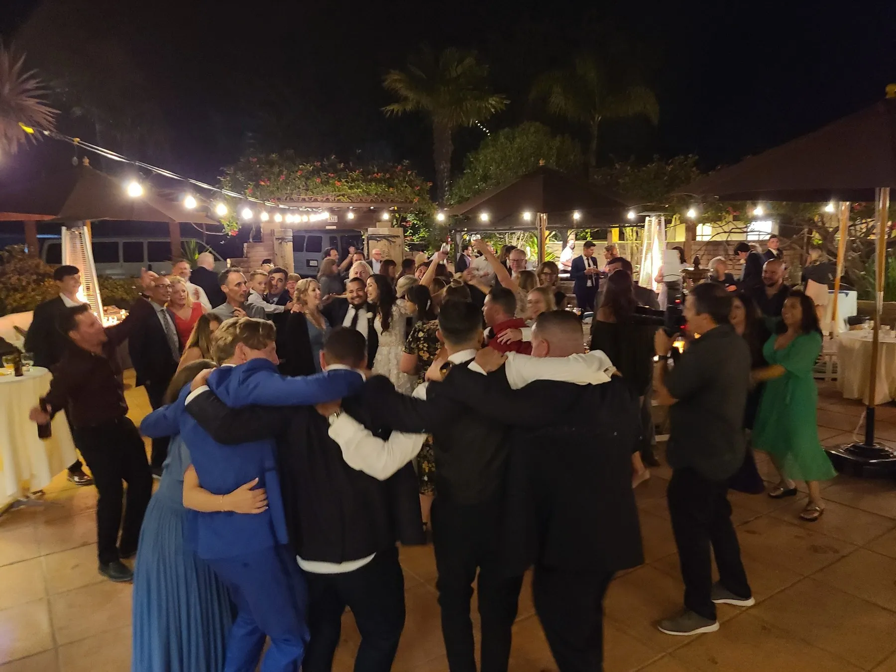 Guests celebrating together at an evening event