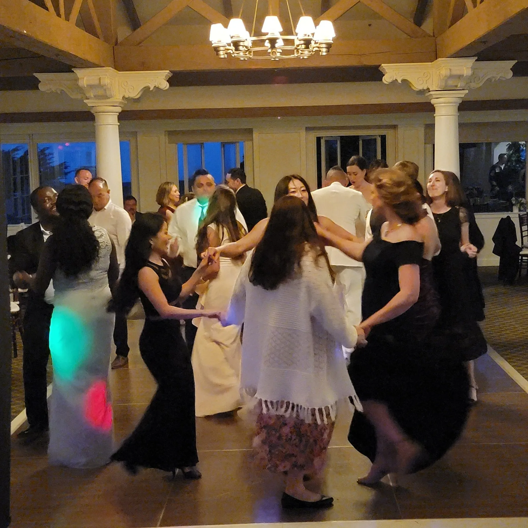 Guests dancing together at a private Icon DJ event